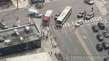 Man in life-threatening condition after being hit by bus in North York