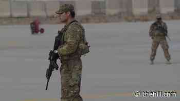 Biden says troops will stay in Afghanistan until all Americans are out