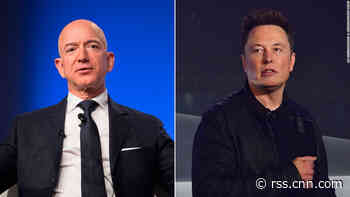 Elon Musk and Jeff Bezos are arguing over the moon already. Here's what it all means