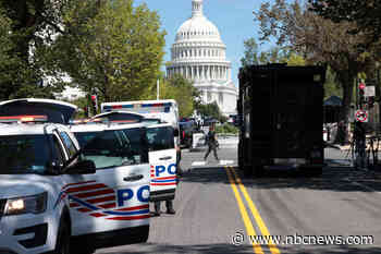 Suspect in Washington, D.C., bomb threat surrenders after hourslong standoff