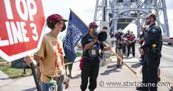 Line 3 protesters briefly shut down Duluth's Aerial Lift Bridge