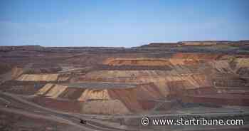What did the topography of the Iron Range look like before it was mined?