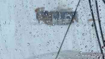 Rain falls on Greenland's normally snowy summit for the first time on record