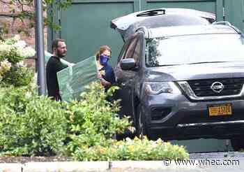 Movers are seen at mansion as Cuomo prepares to leave office
