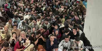 Striking image shows hundreds of Afghans crowded aboard evacuation flight