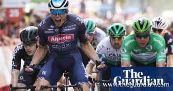 Jasper Philipsen takes victory in windy Vuelta stage after chaotic mass crash - The Guardian