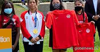 Manitoba NDP honour Olympic gold medalist Desiree Scott with certificate of achievement - Global News