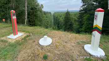 What's causing the crisis on the Belarus-Lithuania border?