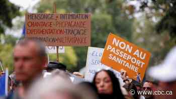 Thousands protest across France as COVID-19 health pass comes into effect