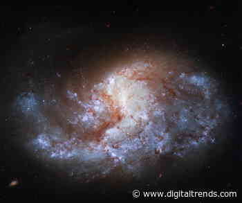 Hubble captures a beautiful galaxy located in a cosmic crucible