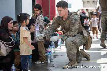 Infants, children being rescued in Afghanistan seen in gripping photos