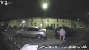 Man caught on CCTV deliberately puncturing tyres using 'sharp object'