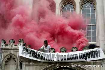 Extinction Rebellion protesters spray red paint after scaling Guildhall entrance - Dudley News