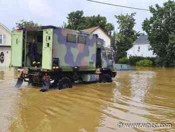 Henri's lazy remnants hinder cleanup, threaten inland floods