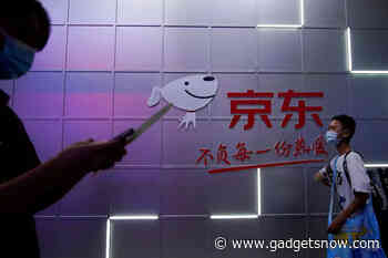 JD.com beats estimates, adds record new users