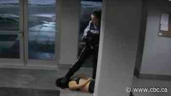 Kelowna RCMP officer captured on video dragging nursing student charged with assault