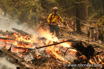 Explosive California wildfire 'knocking on the door' of Tahoe area