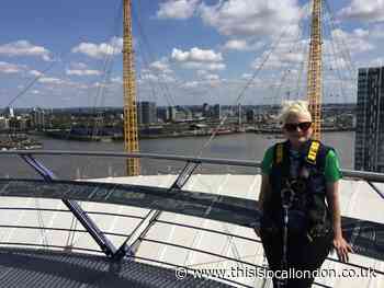 Macmillan: Woman scales the O2 in Greenwich in memory of mum