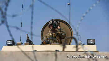 US troops surge evacuations out of Kabul but threats persist