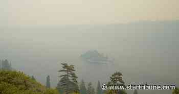 Crews struggle to stop fire bearing down on Lake Tahoe