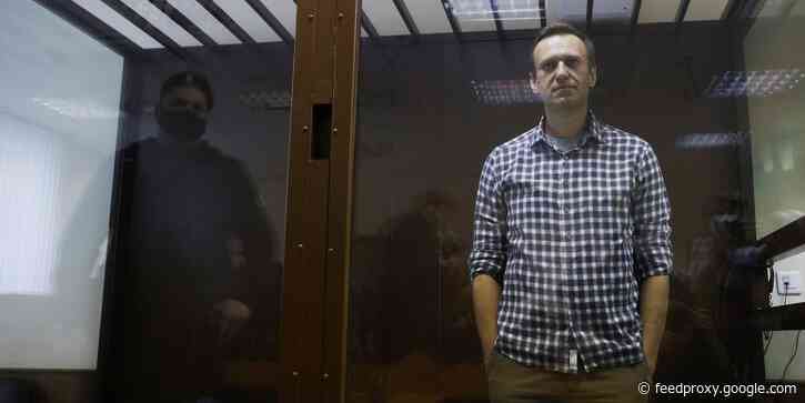 Jailed Putin critic Navalny says he's being forced to watch Russian state TV and propaganda films for over 8 hours a day