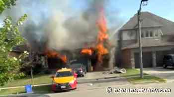Woman charged with arson after driving vehicle into Pickering home that later caught fire