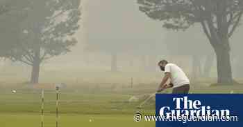 Lake Tahoe shrouded in smoke from surging Caldor fire – in pictures