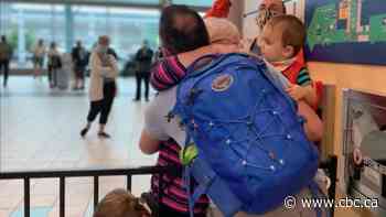 A bittersweet pandemic reunion a year after son's birth and grandpa's tragic passing