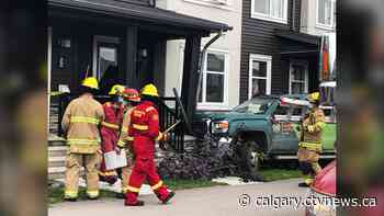 Pickup truck collides with porch of northeast Calgary townhome - CTV News Calgary