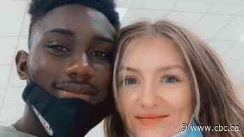 Canadian-American couple finally has airport reunion moment after meeting on app