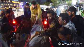 Afghans who narrowly avoided the explosion detail horrifying scenes and piles of victims' bodies