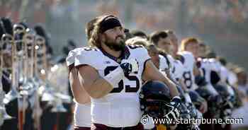 Former University of Minnesota football player sues school for head injuries sustained as student athlete