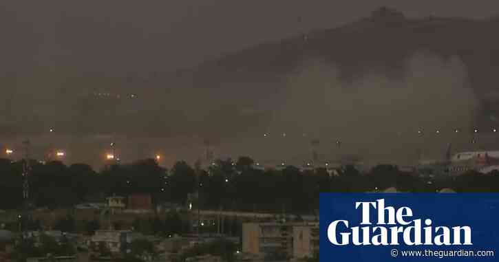 Suicide bomb striking Kabul airport kills dozens in Afghanistan – video report