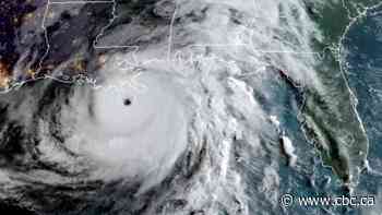 Hurricane set to hit Louisiana coast as COVID-19 infections surge