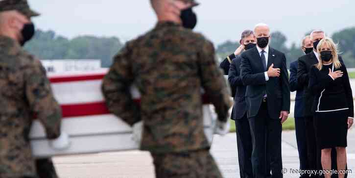 Biden pays respects to the 13 fallen US service members killed in Afghanistan at Dover Air Force Base
