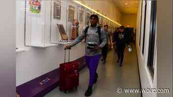 LSU Tigers arrive safely in Houston after evacuating from Baton Rouge - WBRZ