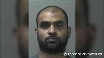 Toronto police release photo of suspect wanted in murder of man found in burning car