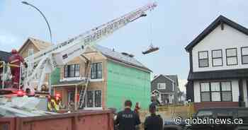 Roofer injured after falling into adjacent basement at southeast Calgary construction site - Global News