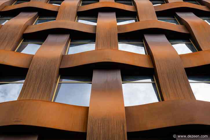 Sergei Tchoban uses Corten steel to create huge basket-weave facade