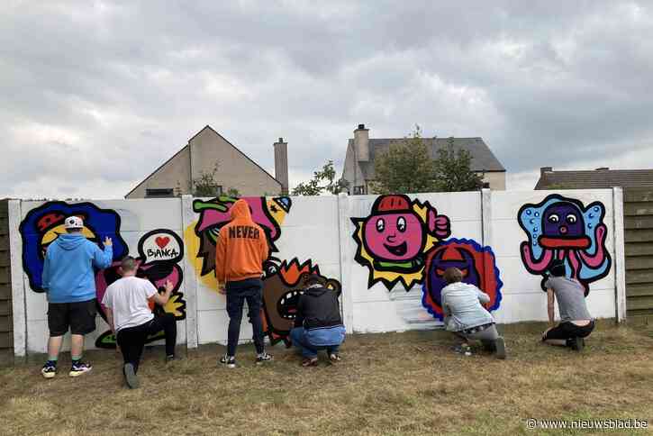 Creatieve gasten MPI Oosterlo wijden graffitimuur in