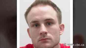 Calgary police looking for person of interest after man found dead in downtown apartment