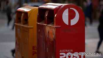 Australia Post to pause parcel pick-up for four days with 500 staff in COVID isolation