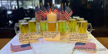 13 beers on an empty table: Restaurants honor US military killed in Afghanistan