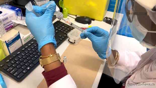 'An important step': Some Albertans line up for third COVID-19 vaccine shot