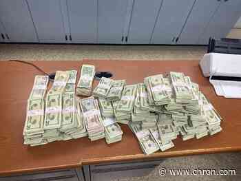 Houston-area cops find stolen Lamborghini with cache of guns and cash inside