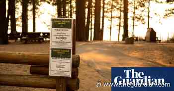 Empty beaches and eerie skies as Caldor fire looms over Lake Tahoe – in pictures