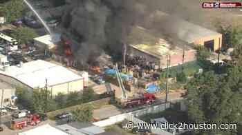 Firefighters battle massive fire at warehouse in southwest Houston - KPRC Click2Houston