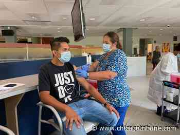 Aurora-area colleges working to comply with COVID-19 vaccination mandate for students, teachers - Chicago Tribune