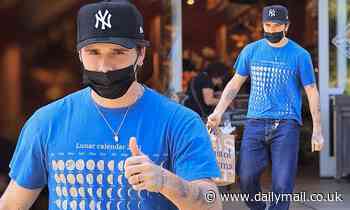 Brooklyn Beckham stocks up on food amid claims he's 'in talks to host an online cookery series' - Daily Mail