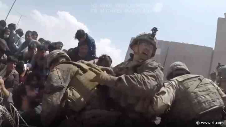 Terrified civilians, shots fired & smashed gear: Leaked VIDEO of US Afghan exit offers unvarnished look at chaotic evacuation